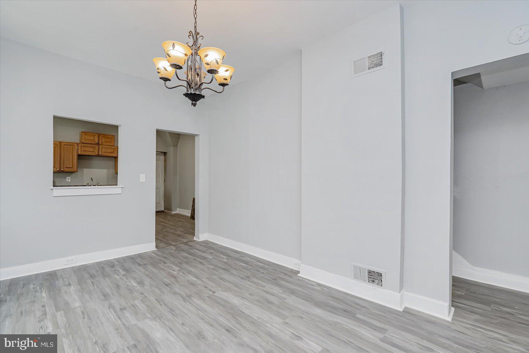 1607 Filbert Street Curtis Bay, MD 21226 - Photo 9 of 33 a view of an entryway with wooden floor