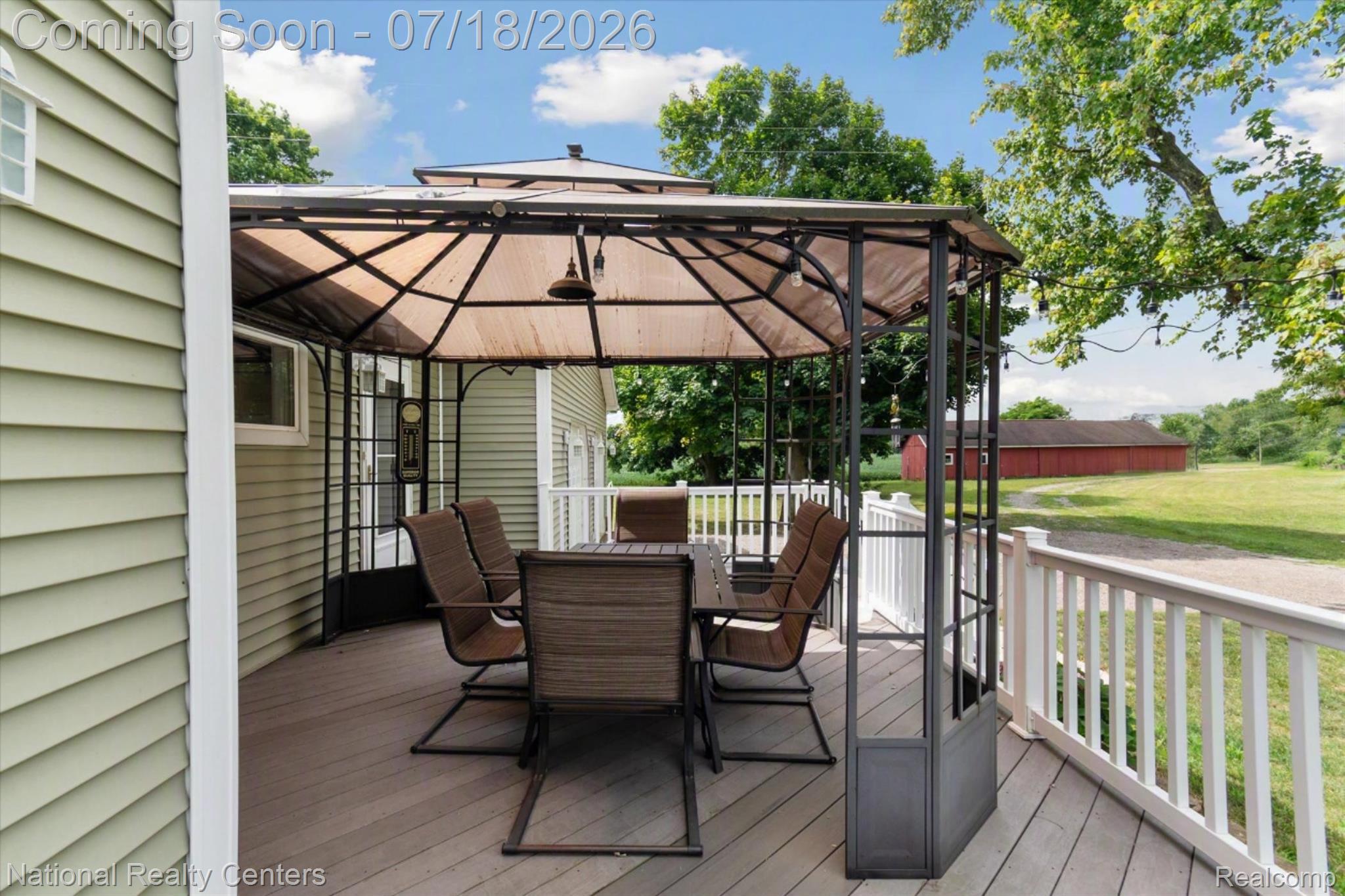 9589 Clinton Macon Road Tecumseh, MI 49286 - Photo 35 of 48 Deck featuring a covered gazebo structure