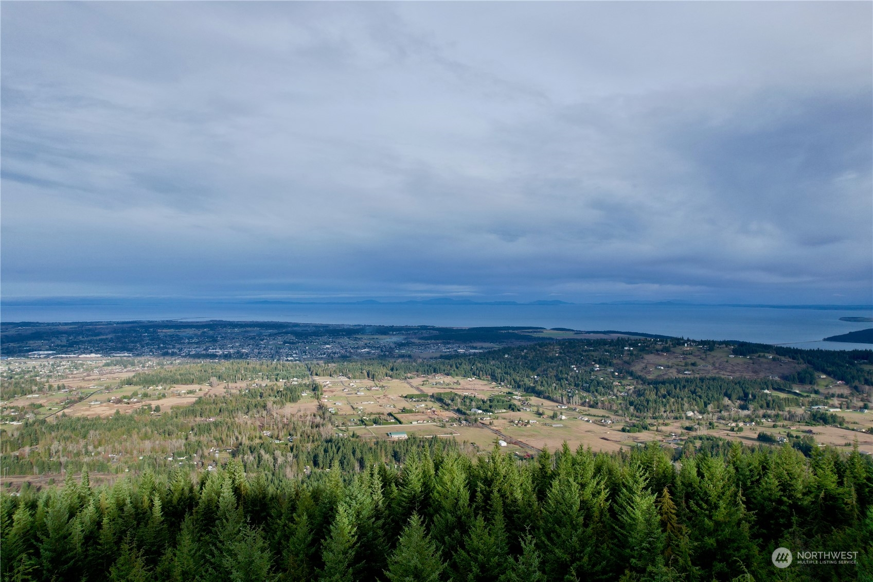 9999 Broadview Drive Sequim, WA 98382 - Photo 27 of 27 a view of a large body of water and lots of trees