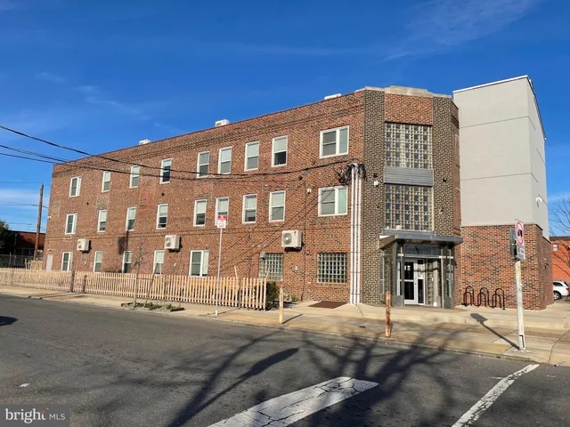 a front view of a building with street