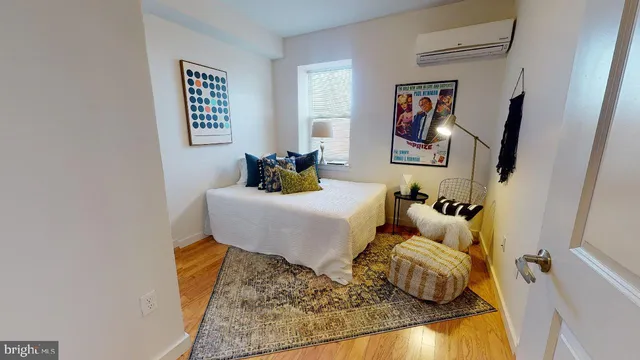 a bed room with a bed and a couch