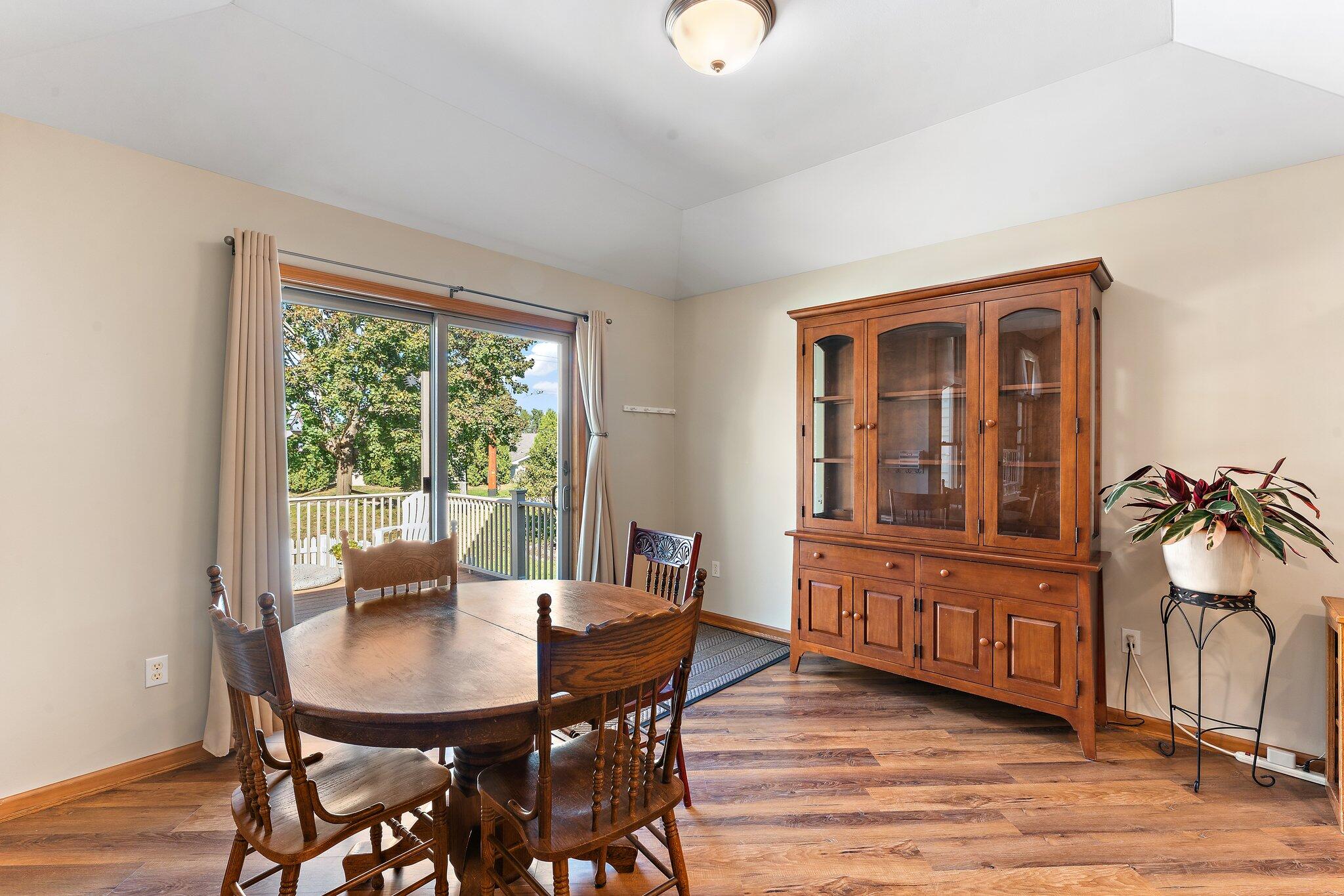 1636 Edith Way Crown Point, IN 46307 - Photo 16 of 56 a view of a dining room with furniture window and wooden floor