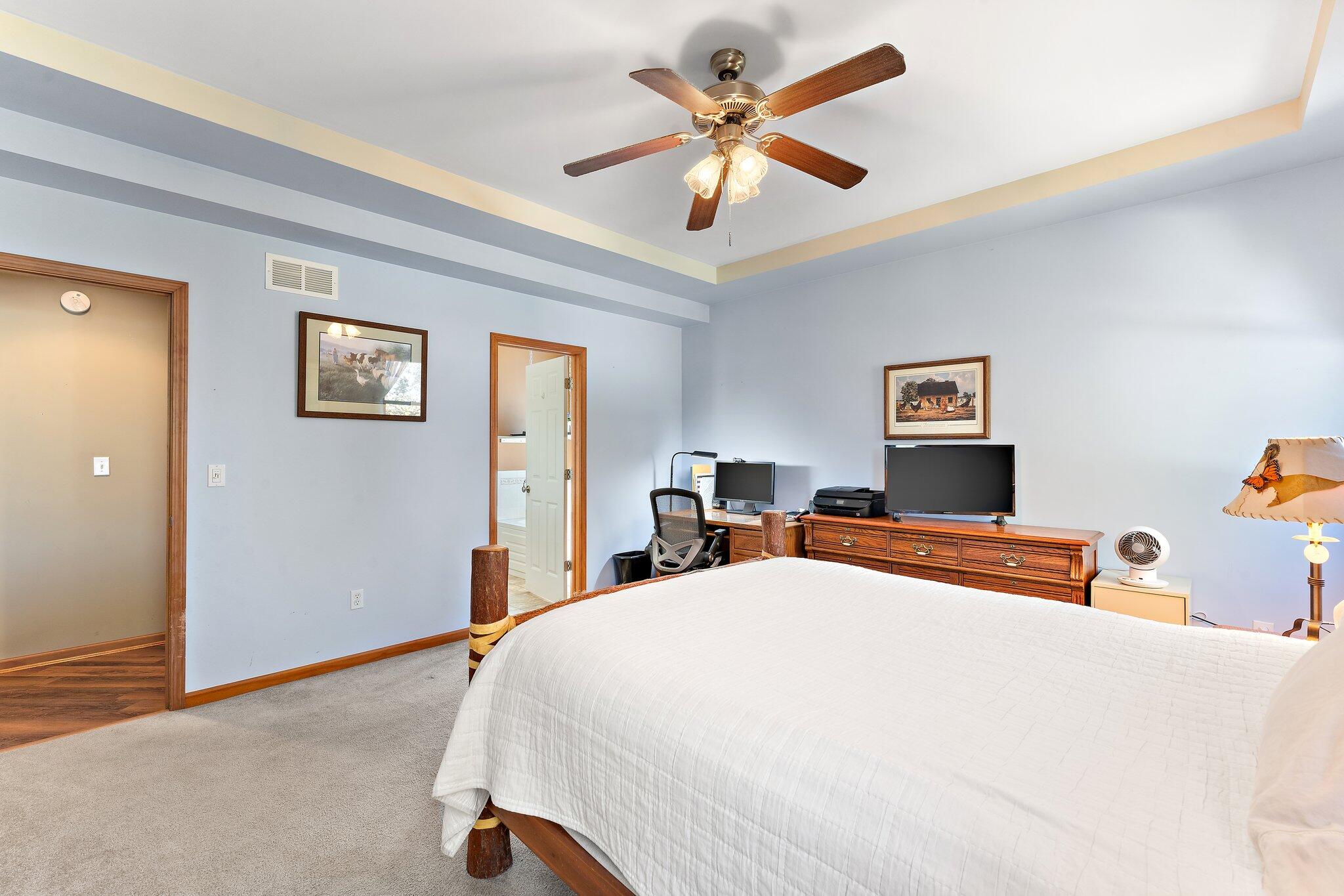 1636 Edith Way Crown Point, IN 46307 - Photo 24 of 56 a bedroom with a bed and a chandelier