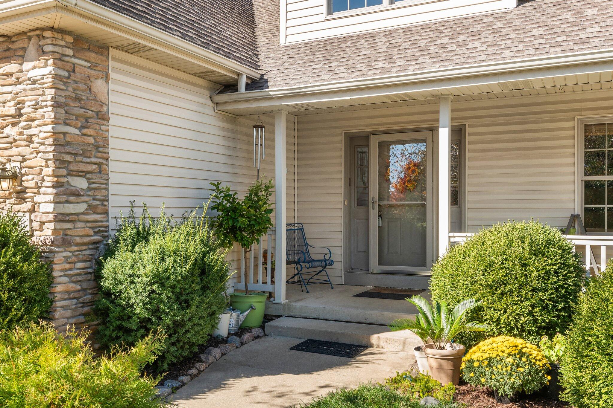 1636 Edith Way Crown Point, IN 46307 - Photo 3 of 56 a front view of a house with a yard