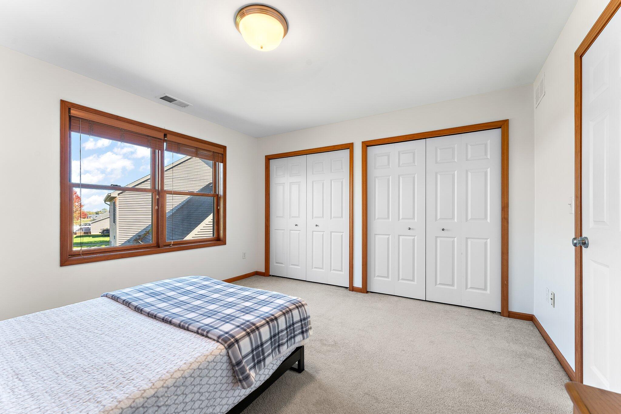 1636 Edith Way Crown Point, IN 46307 - Photo 33 of 56 a bedroom with a bed and a window