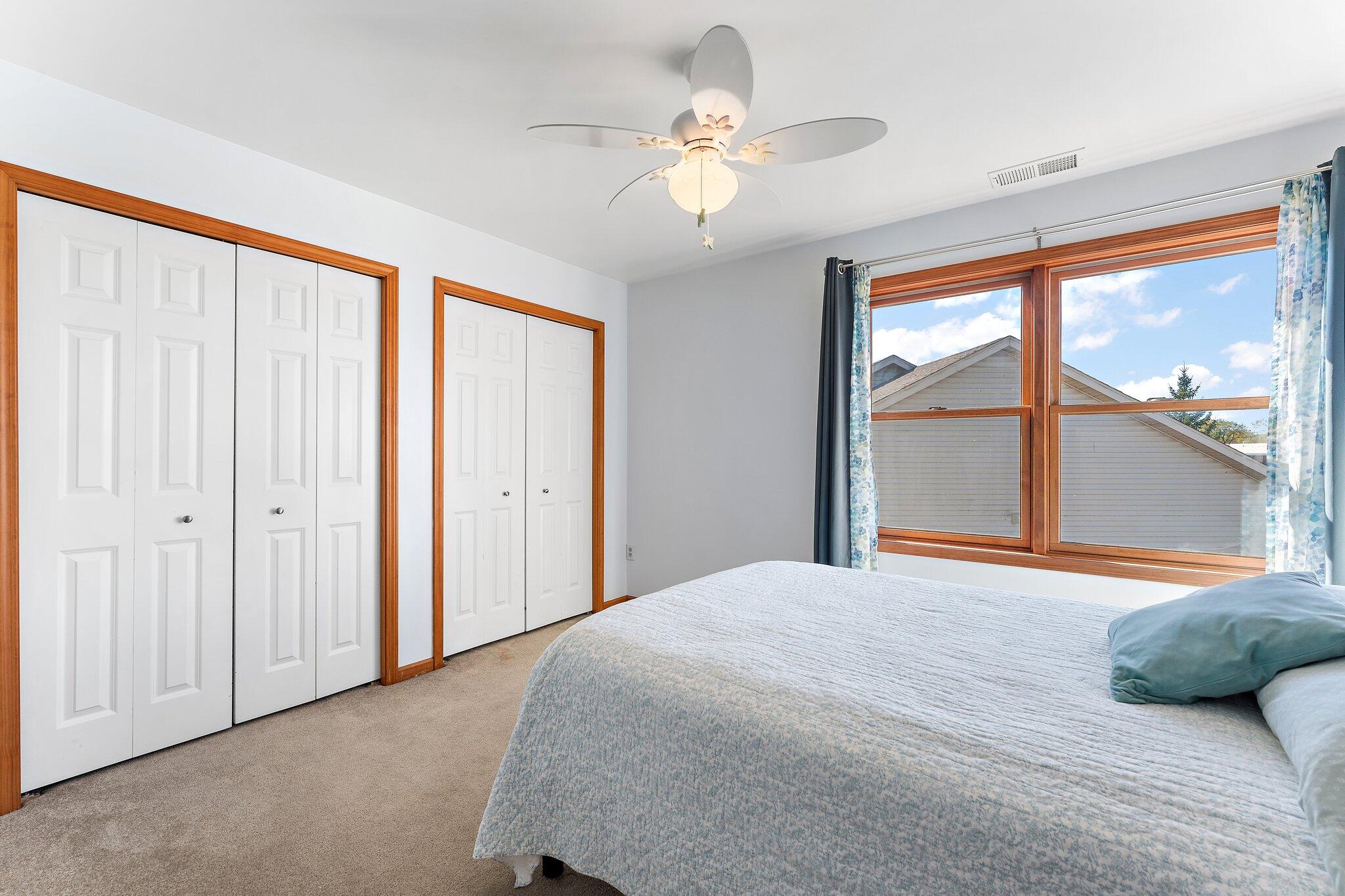 1636 Edith Way Crown Point, IN 46307 - Photo 36 of 56 a bedroom with a large bed and a large window with outer view