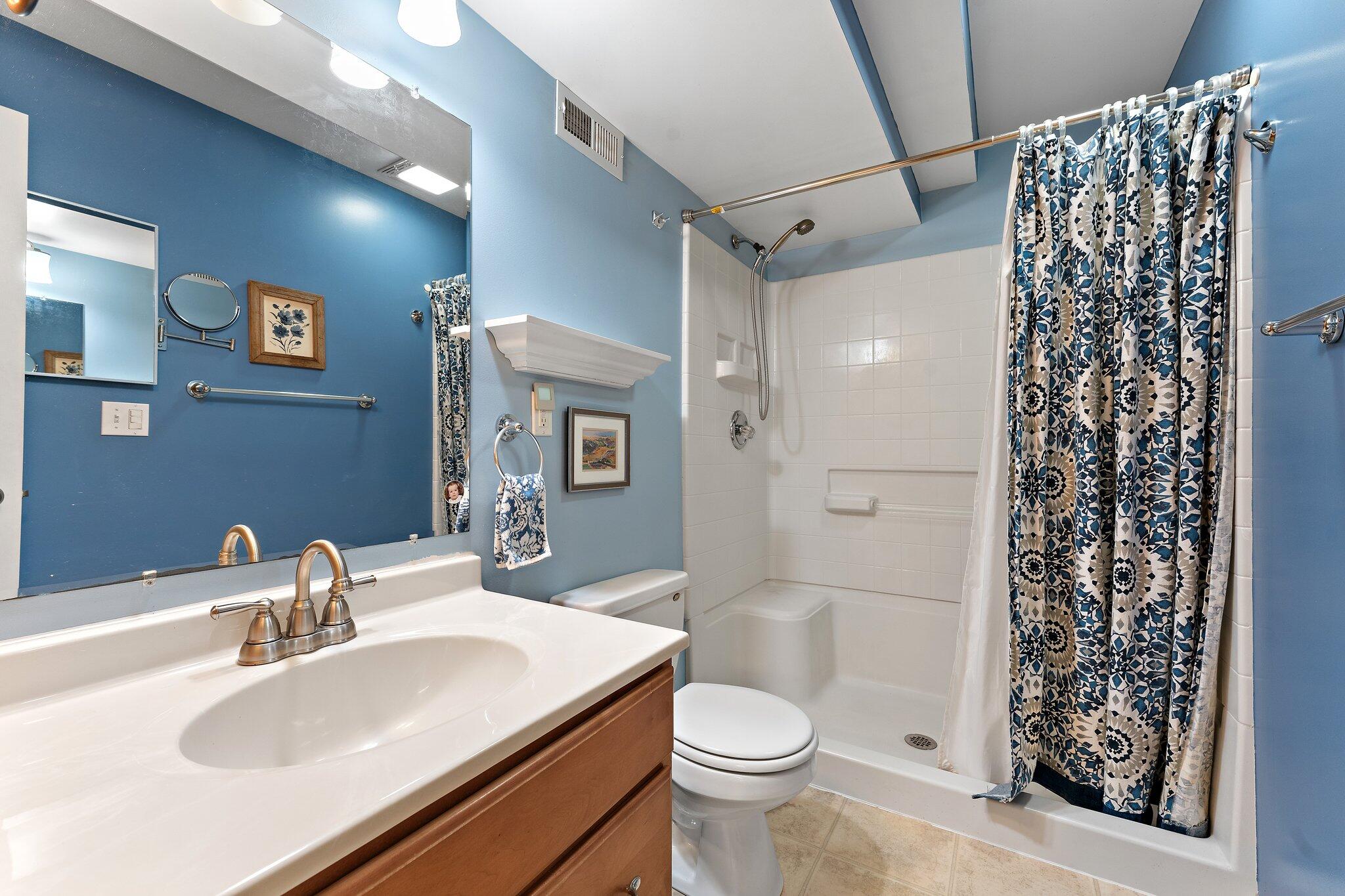 1636 Edith Way Crown Point, IN 46307 - Photo 42 of 56 a bathroom with a sink toilet and shower