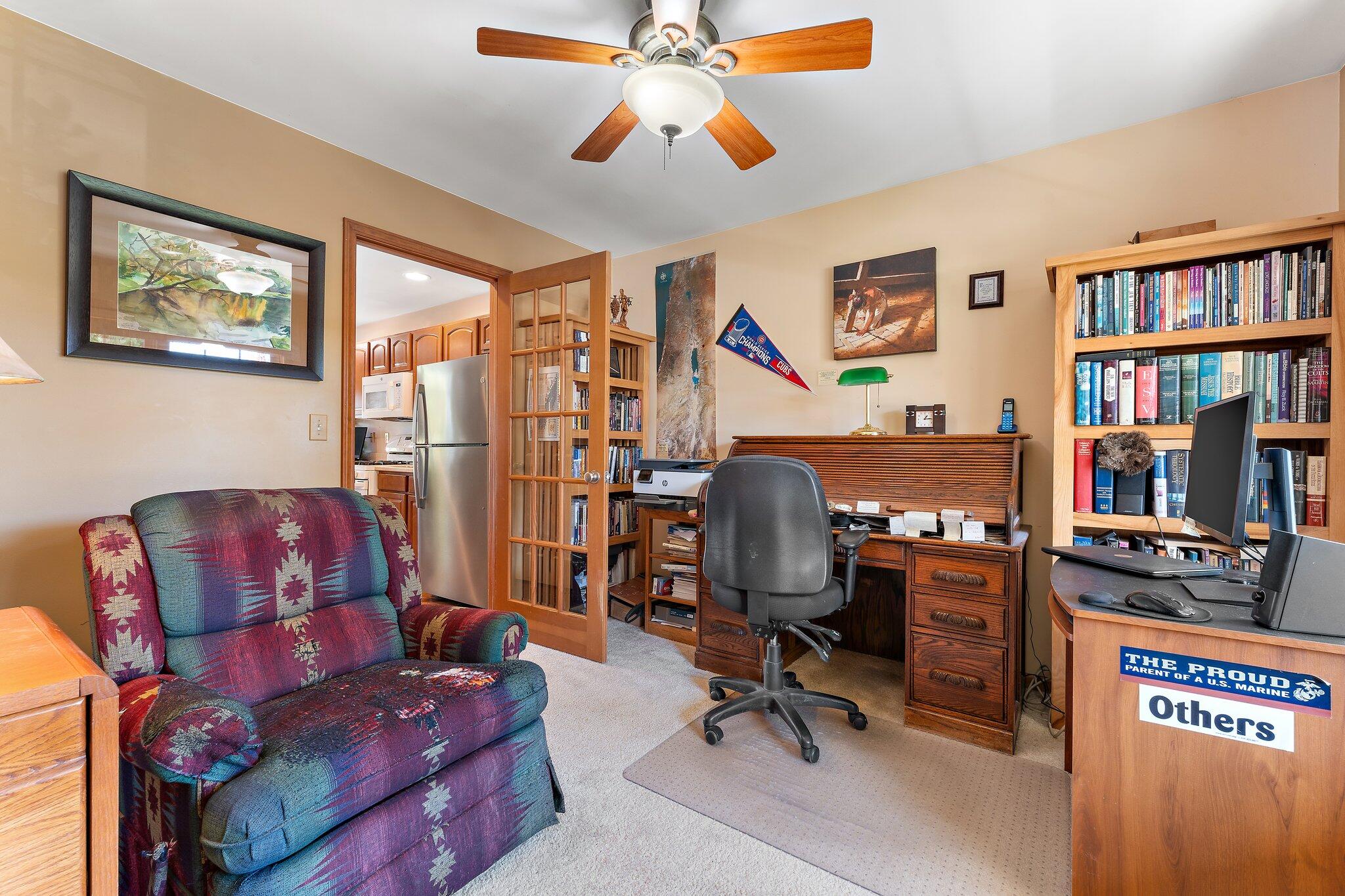 1636 Edith Way Crown Point, IN 46307 - Photo 43 of 56 a view of a workspace with furniture and a window