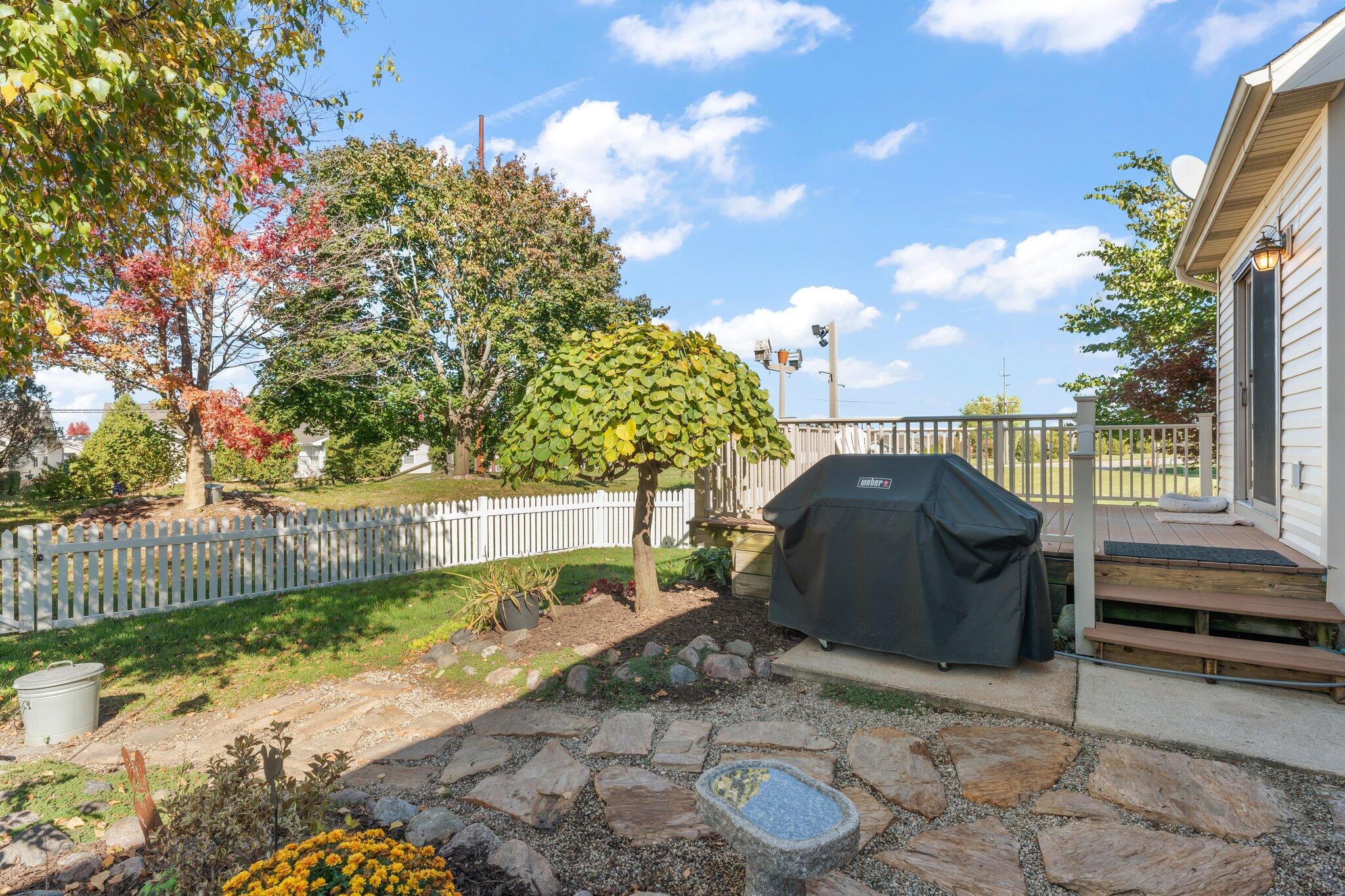 1636 Edith Way Crown Point, IN 46307 - Photo 49 of 56 a view of a backyard with wooden fence