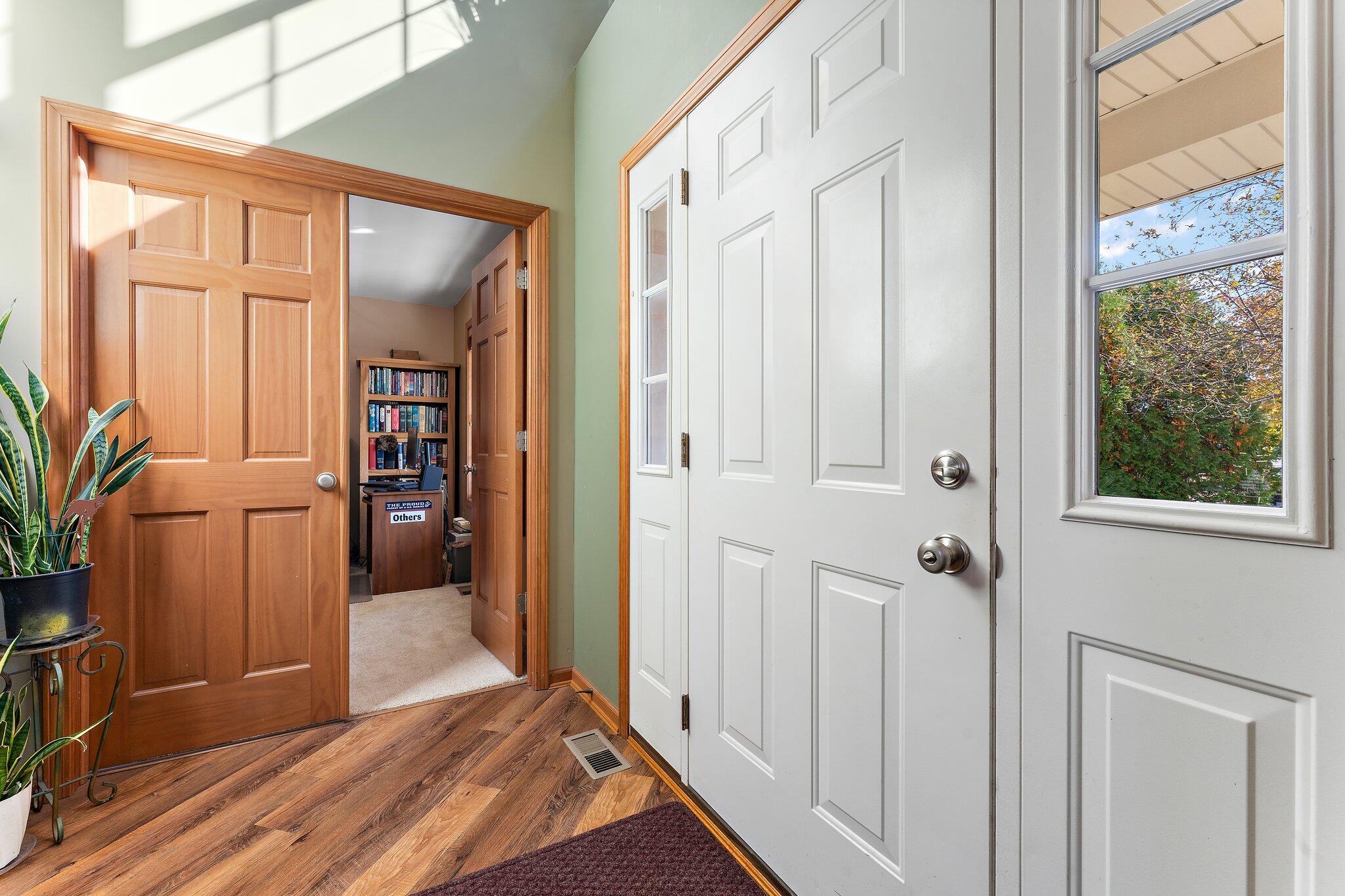 1636 Edith Way Crown Point, IN 46307 - Photo 10 of 56 a view of a hallway with wooden floor and windows