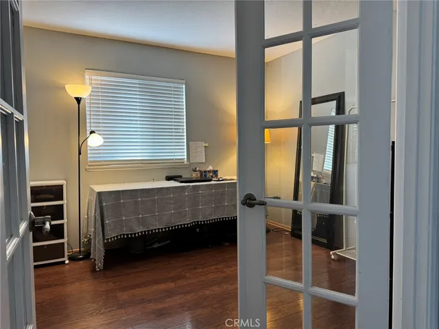 a view of room with furniture and windows