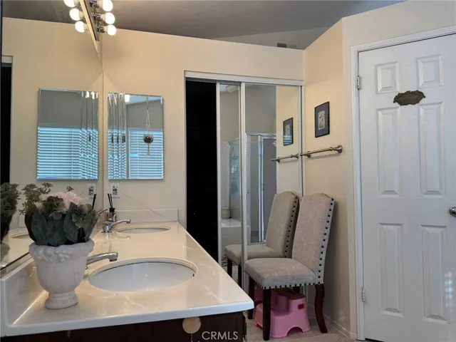 a bathroom with a sink and toilet