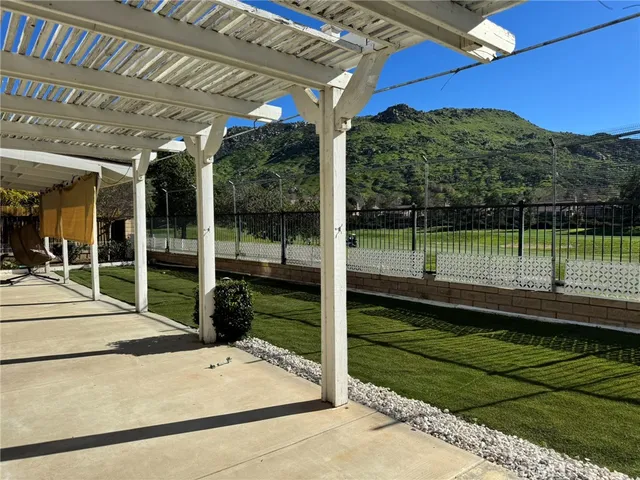 a view of a porch with a backyard