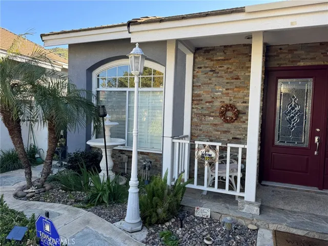 a front view of a house with a porch