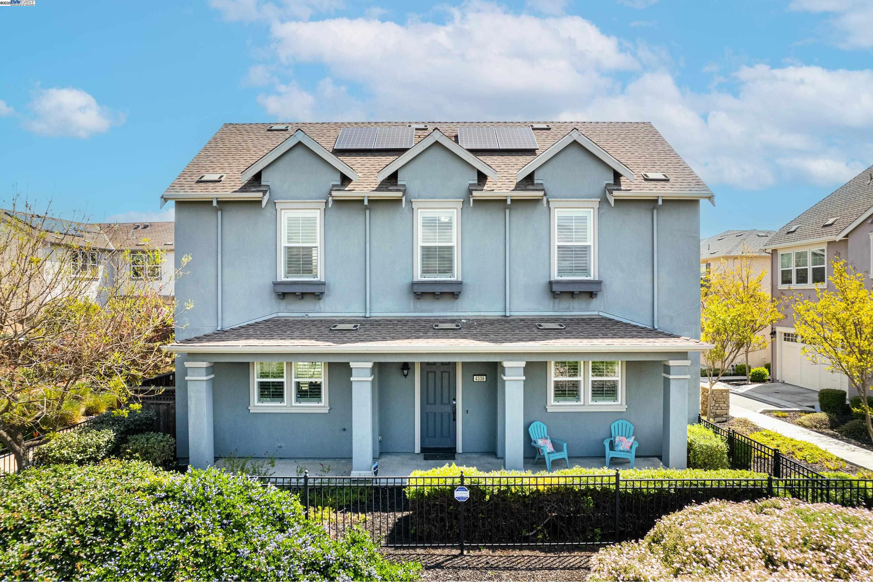 4338 Sunset View Drive Dublin, CA 94568 - Photo 1 of 1 a front view of a house with a yard and garage