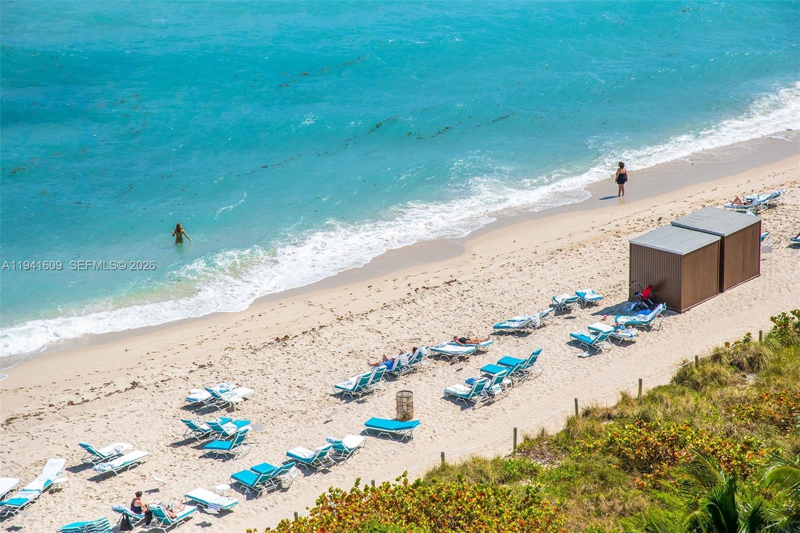 6899 Collins Avenue, Unit 1205 Miami Beach, FL 33141 - Photo 19 of 48 a view of a beach with a ocean view