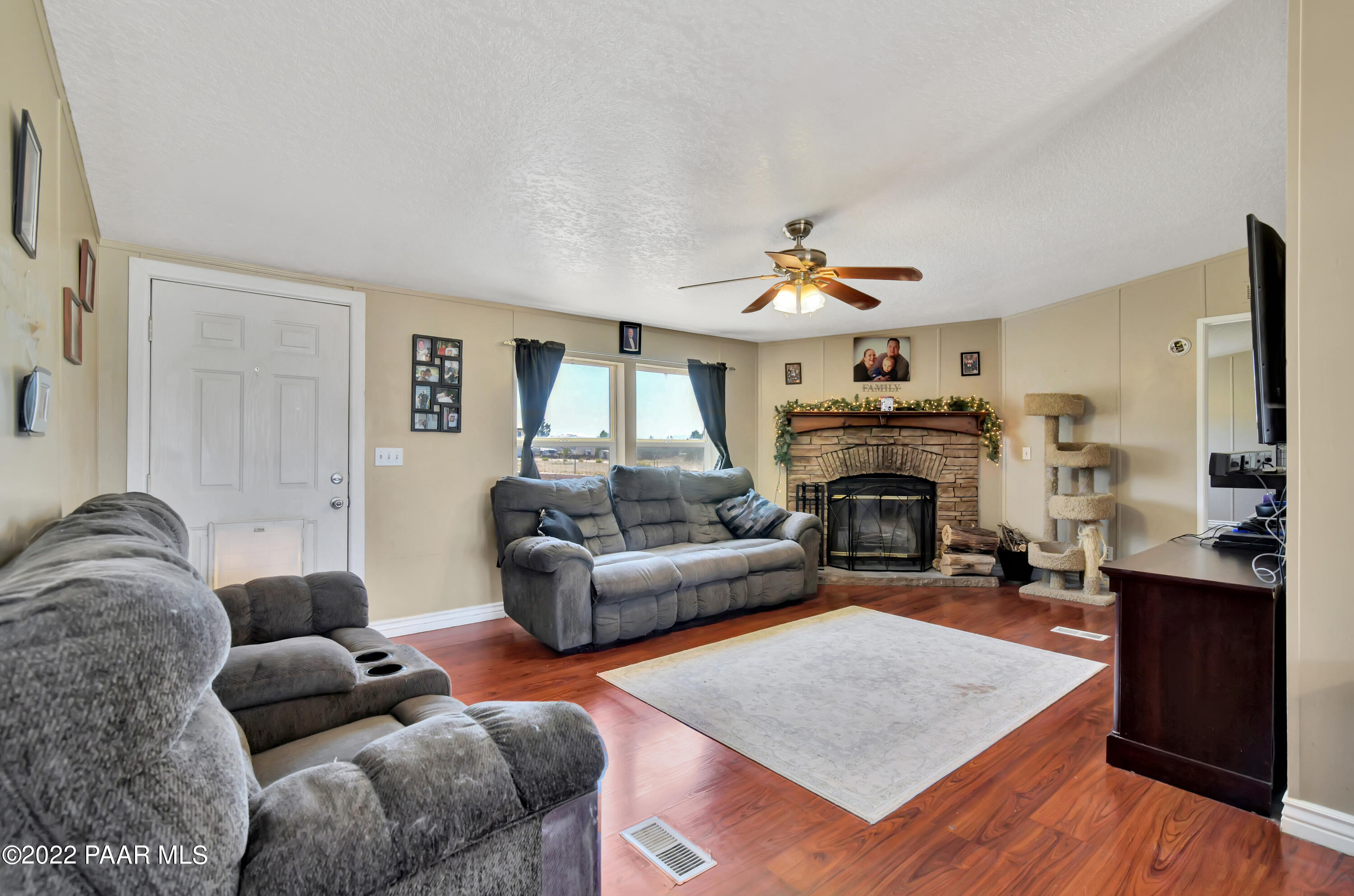 1480 West Brand Iron Road Paulden, AZ 86334 - Photo 3 of 23 Living Room with Cozy Fireplace