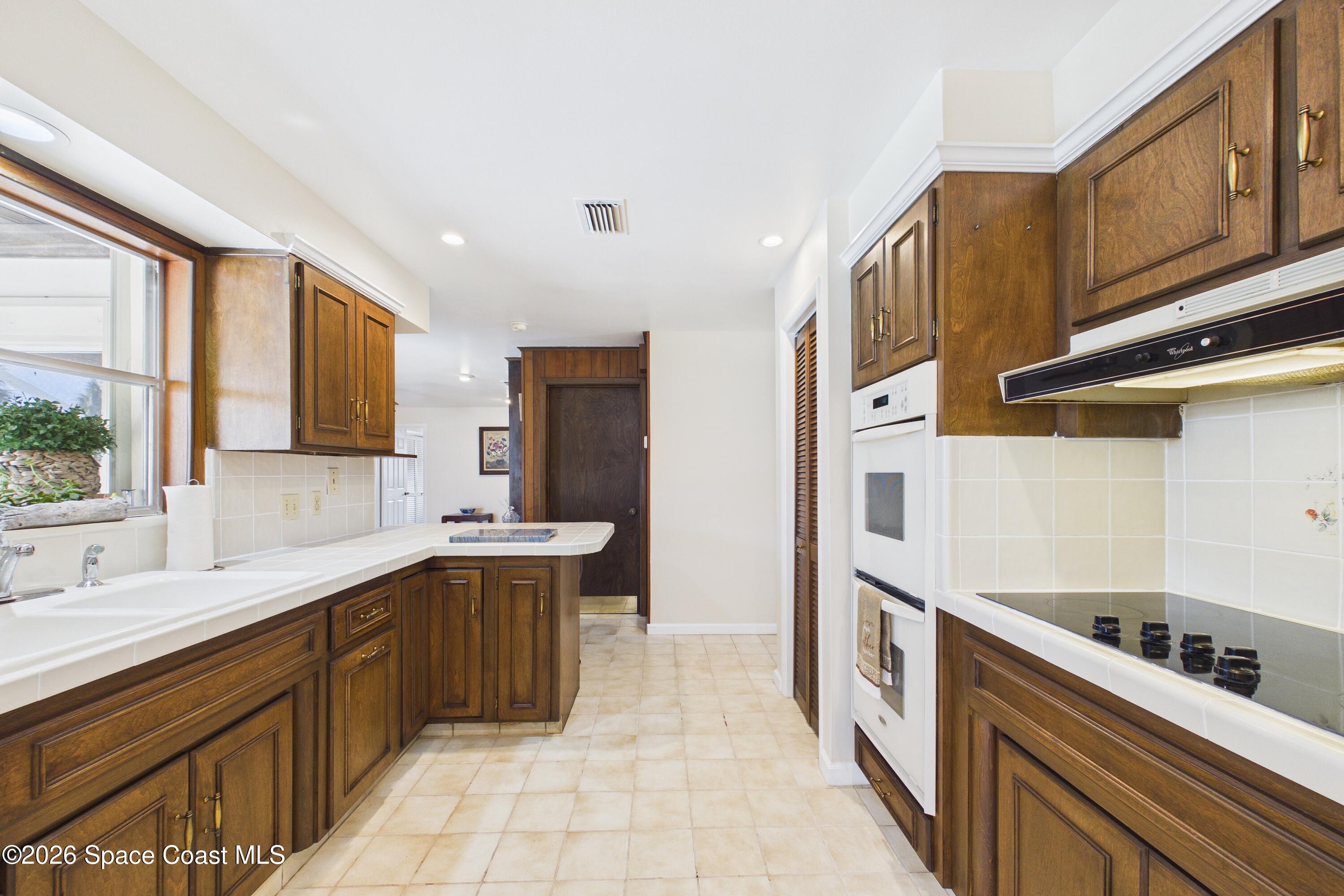 215 Sand Pine Road Indialantic, FL 32903 - Photo 13 of 71 CAM02690G0-PR0233-STILL022_Original