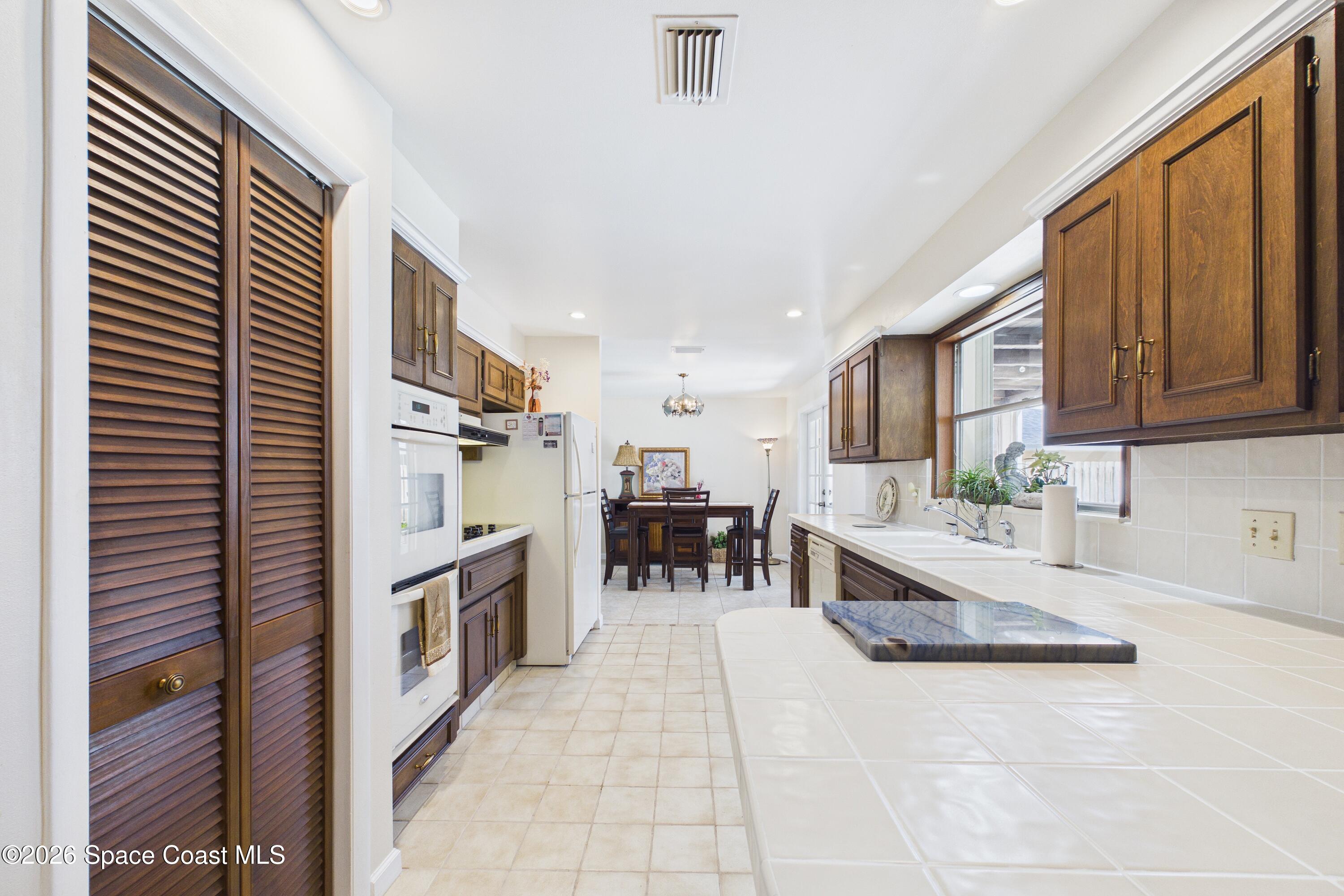 215 Sand Pine Road Indialantic, FL 32903 - Photo 14 of 71 CAM02690G0-PR0233-STILL024_Original