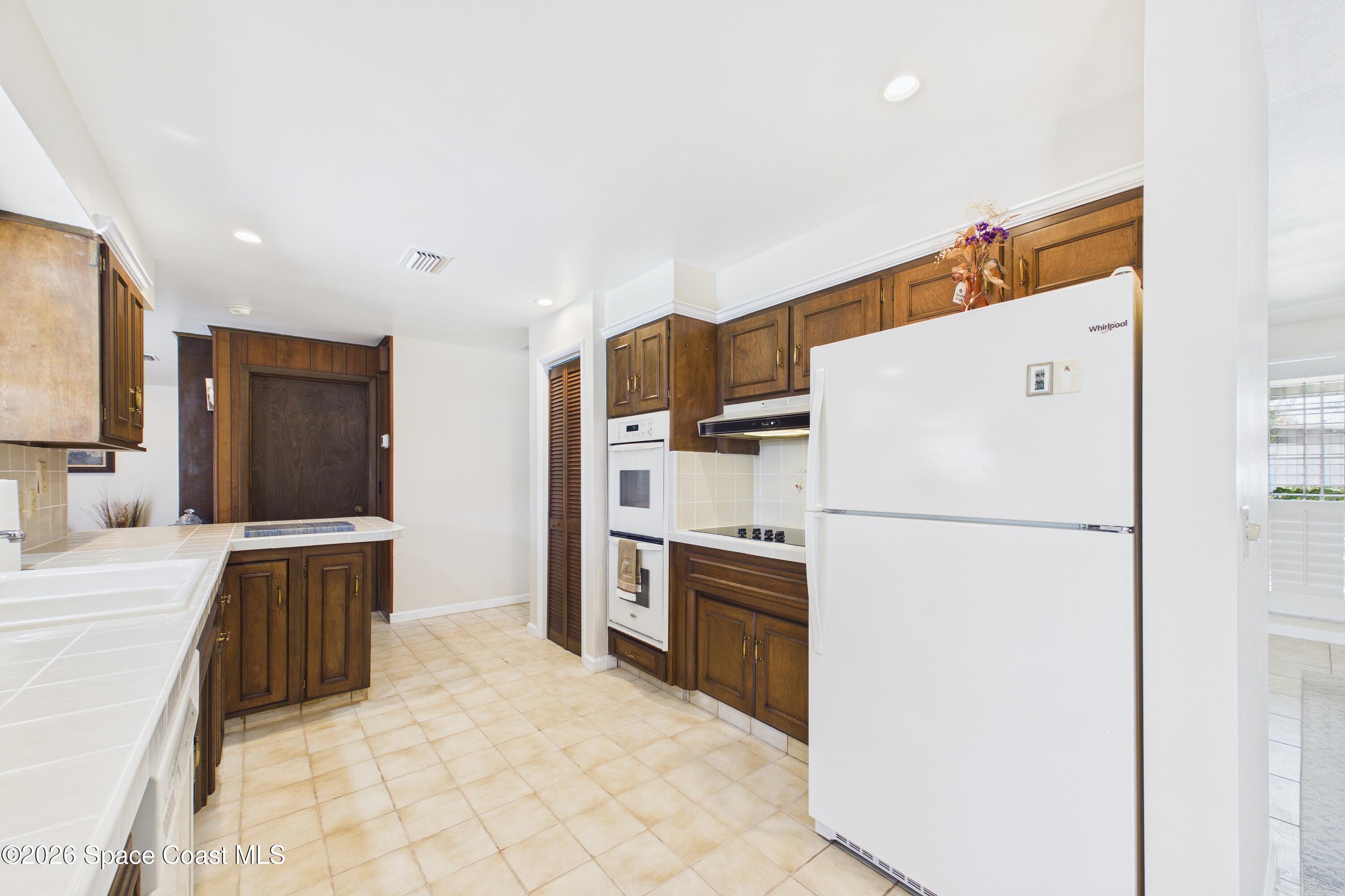 215 Sand Pine Road Indialantic, FL 32903 - Photo 7 of 71 CAM02690G0-PR0233-STILL019_Original