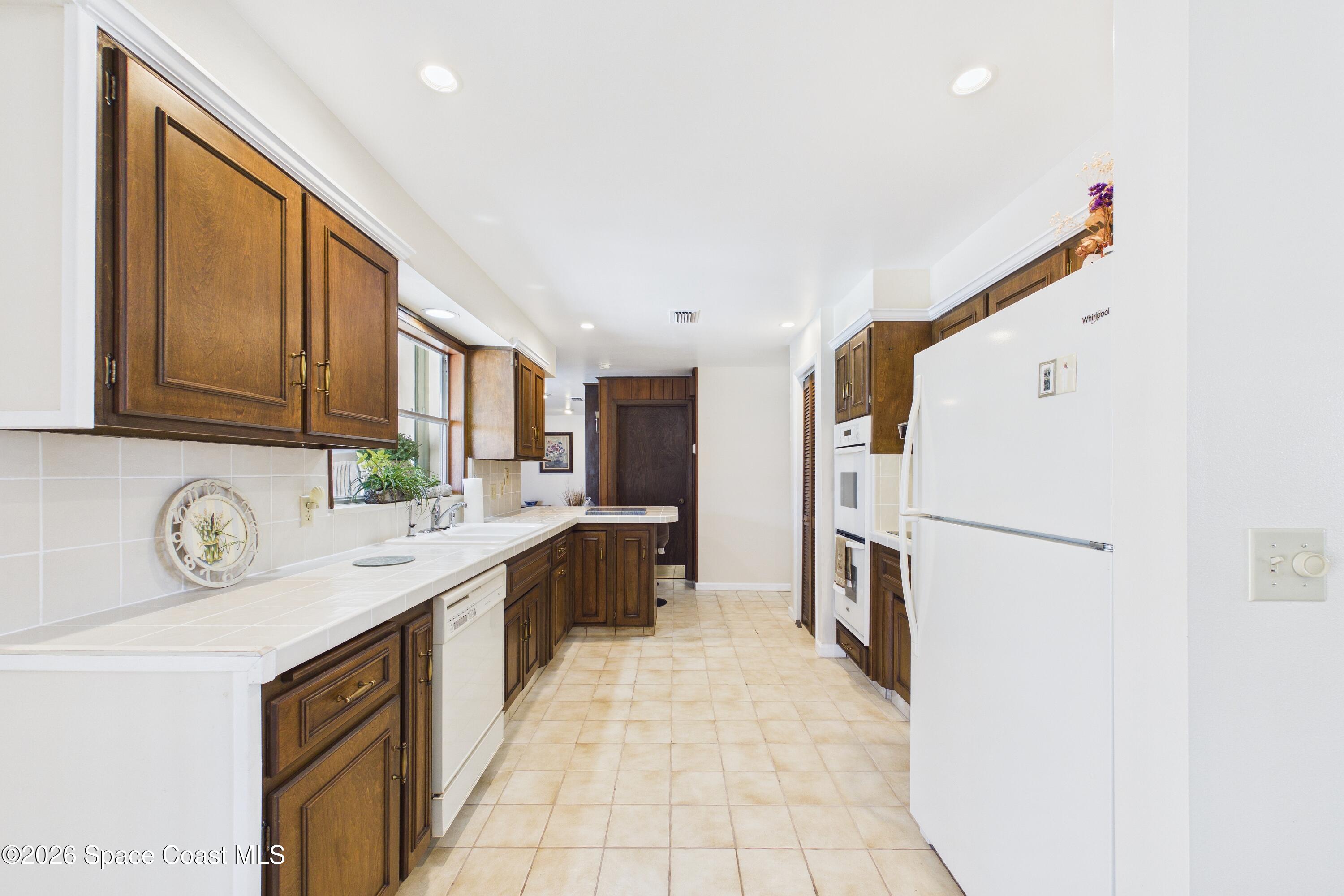 215 Sand Pine Road Indialantic, FL 32903 - Photo 9 of 71 CAM02690G0-PR0233-STILL017_Original