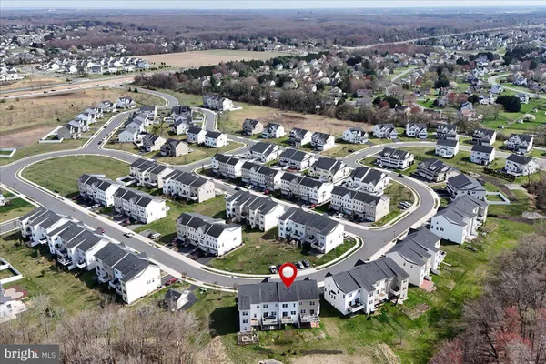 an aerial view of a city with lots of residential buildings