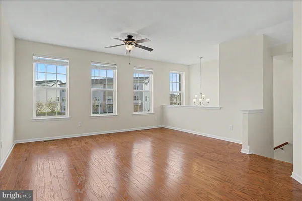 a kitchen with a sink appliances and cabinets