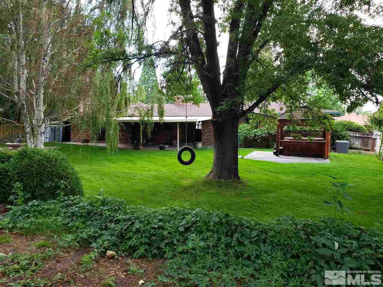 1120 Alpine Circle Reno, NV 89509 - Photo 13 of 21 a view of a garden with a tree