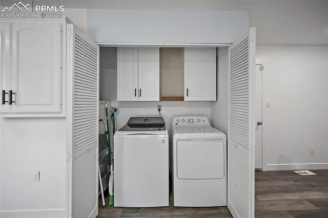 a utility room with dryer and washer