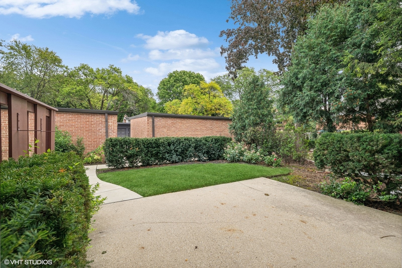 715 Carriage Hill Drive Glenview, IL 60025 - Photo 13 of 18 a view of a street with a tree in front of it