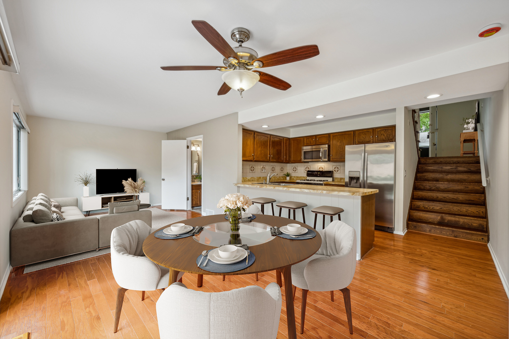 715 Carriage Hill Drive Glenview, IL 60025 - Photo 6 of 18 a view of a dining room with furniture and wooden floor