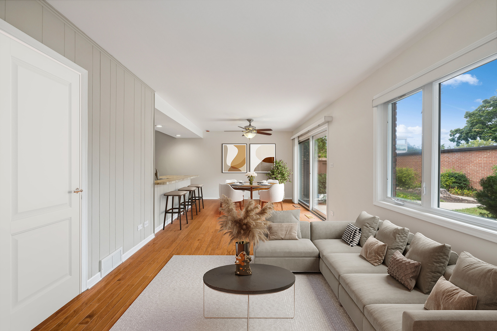 715 Carriage Hill Drive Glenview, IL 60025 - Photo 7 of 18 a living room with furniture and a large window