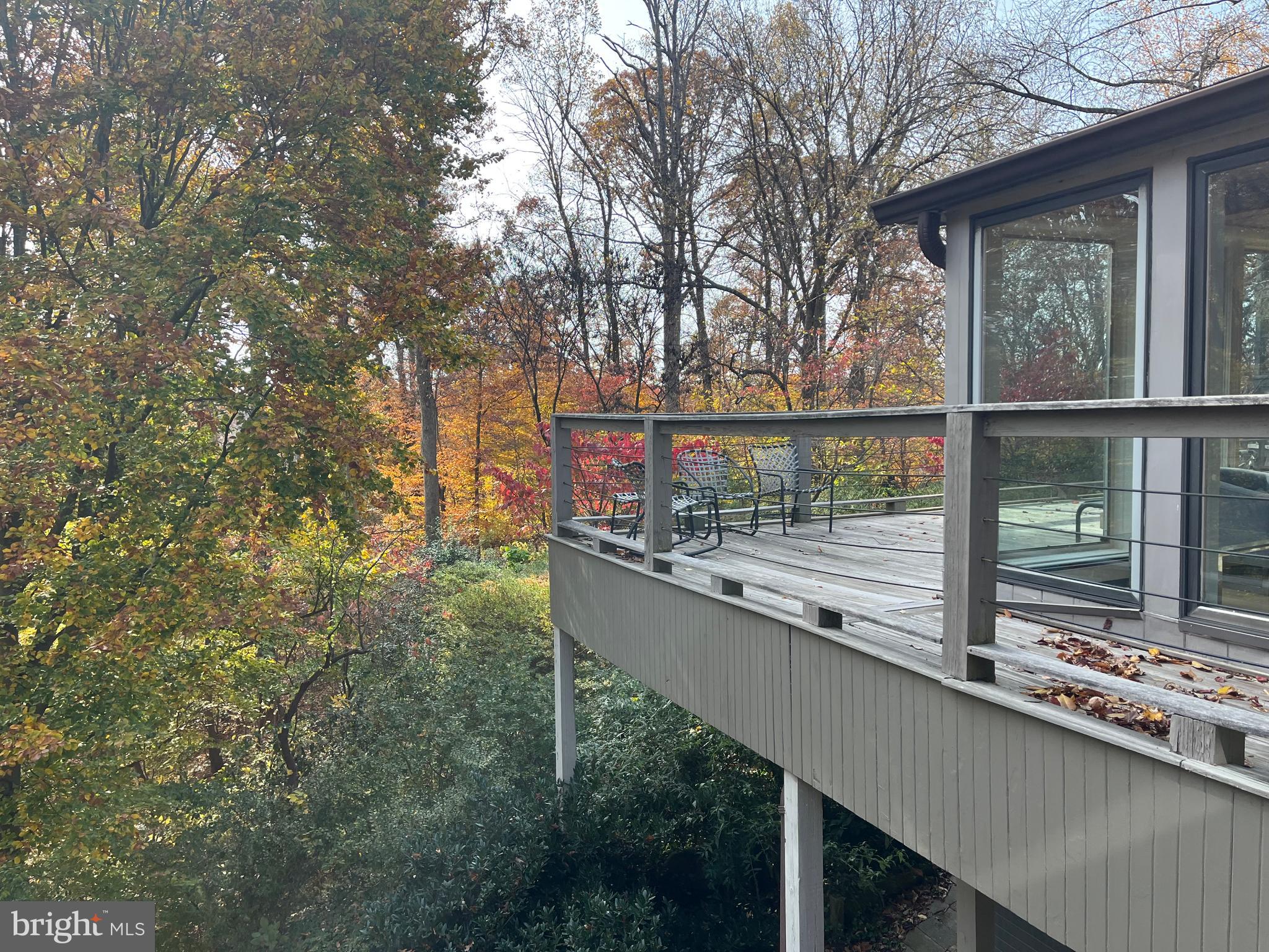 5651 Bent Branch Road Bethesda, MD 20816 - Photo 3 of 16 a view of balcony with mountain view and trees
