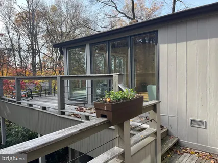 a view of balcony with outdoor seating