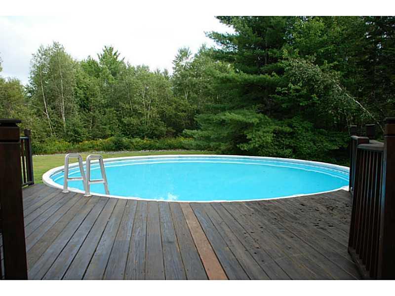 374 Brewer Lake Road Orrington, ME 04474 - Photo 27 of 34 Patio/Deck. Deck was custom built to...