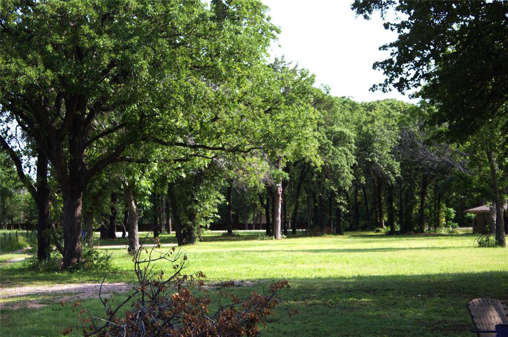 1925 Florence Road Keller, TX 76262 - Photo 13 of 14 a view of a park with trees in the background