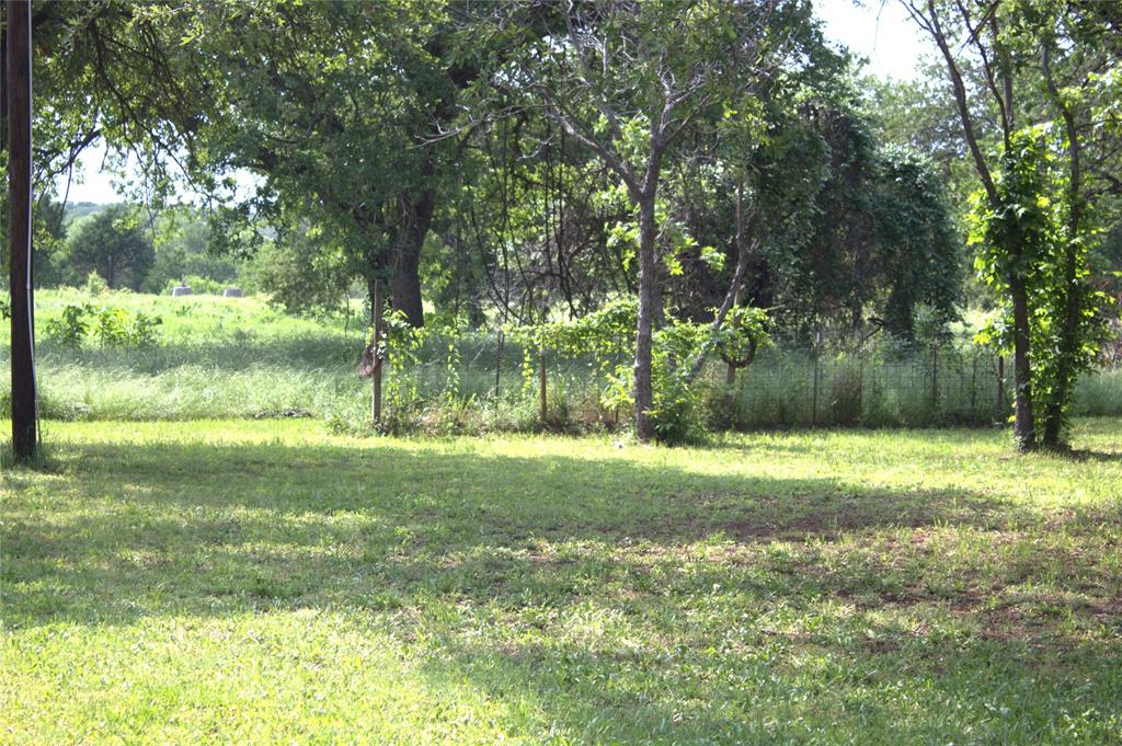 1925 Florence Road Keller, TX 76262 - Photo 3 of 14 a view of a yard with a trees