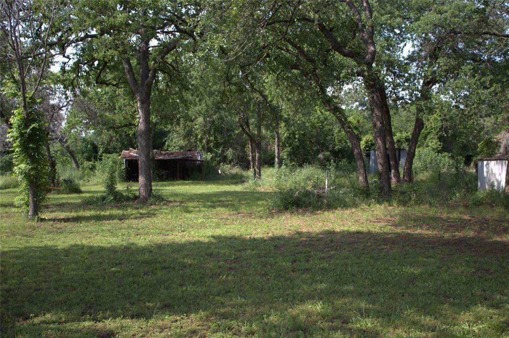 1925 Florence Road Keller, TX 76262 - Photo 8 of 14 a backyard of a house with lots of green space