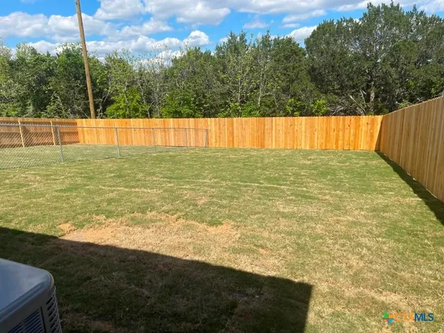 a view of outdoor space and swimming pool