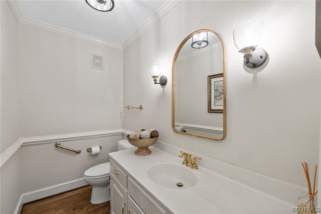 8920 Cardiff Road North Chesterfield, VA 23236 - Photo 23 of 36 a bathroom with a toilet sink and mirror