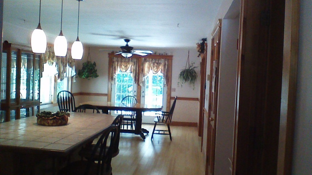 24 Stonefence Road Lunenburg, MA 01462 - Photo 4 of 13 a view of a dining room with furniture window and wooden floor