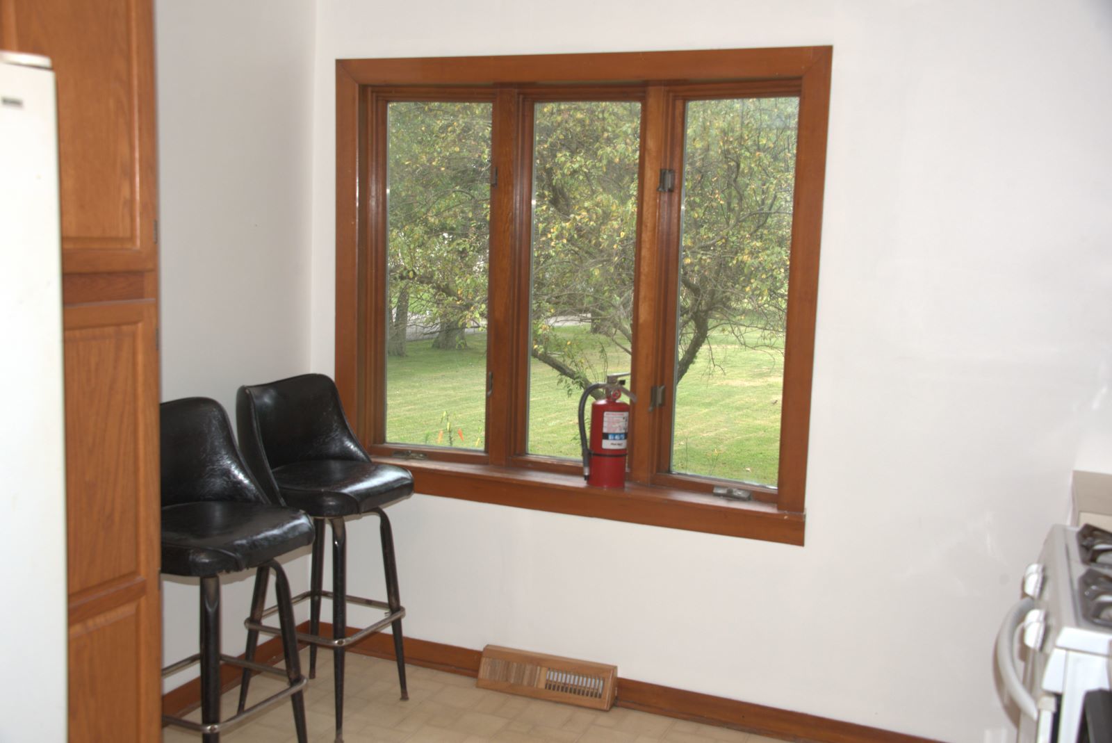 1921 East Steger Road Crete, IL 60417 - Photo 11 of 29 a view of a workspace with furniture and a window