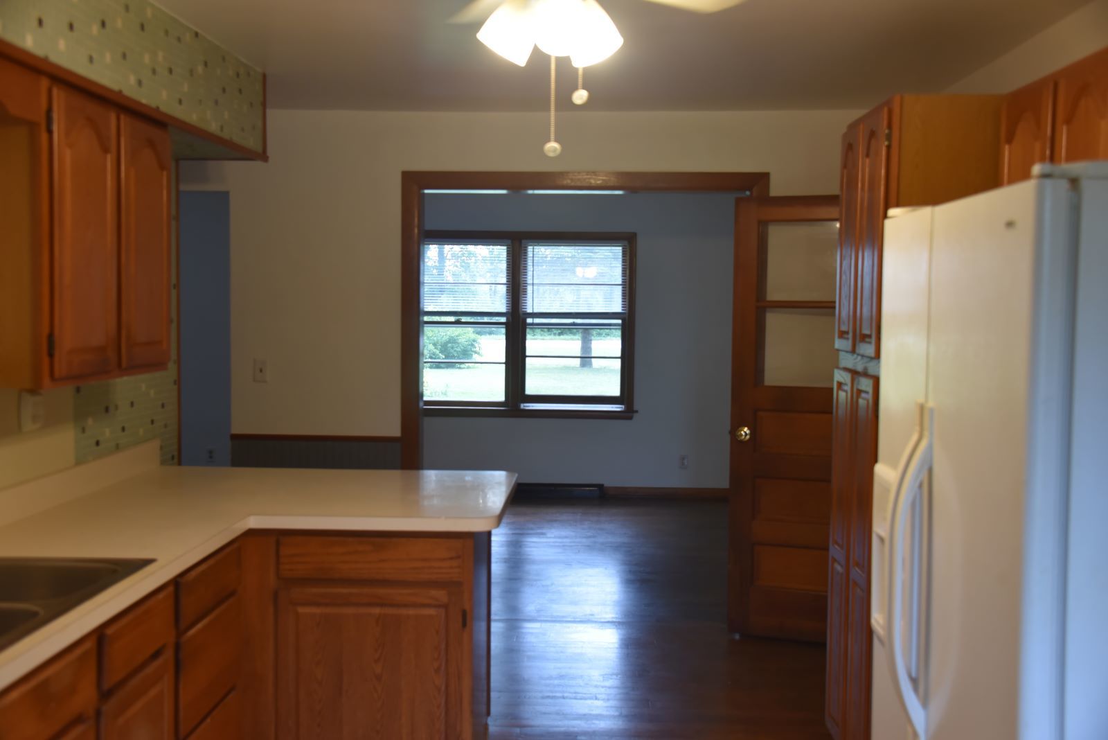 1921 East Steger Road Crete, IL 60417 - Photo 12 of 29 a kitchen with a refrigerator and a sink