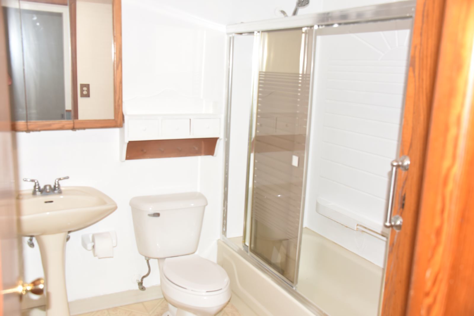 1921 East Steger Road Crete, IL 60417 - Photo 13 of 29 a bathroom with a toilet a sink and a mirror