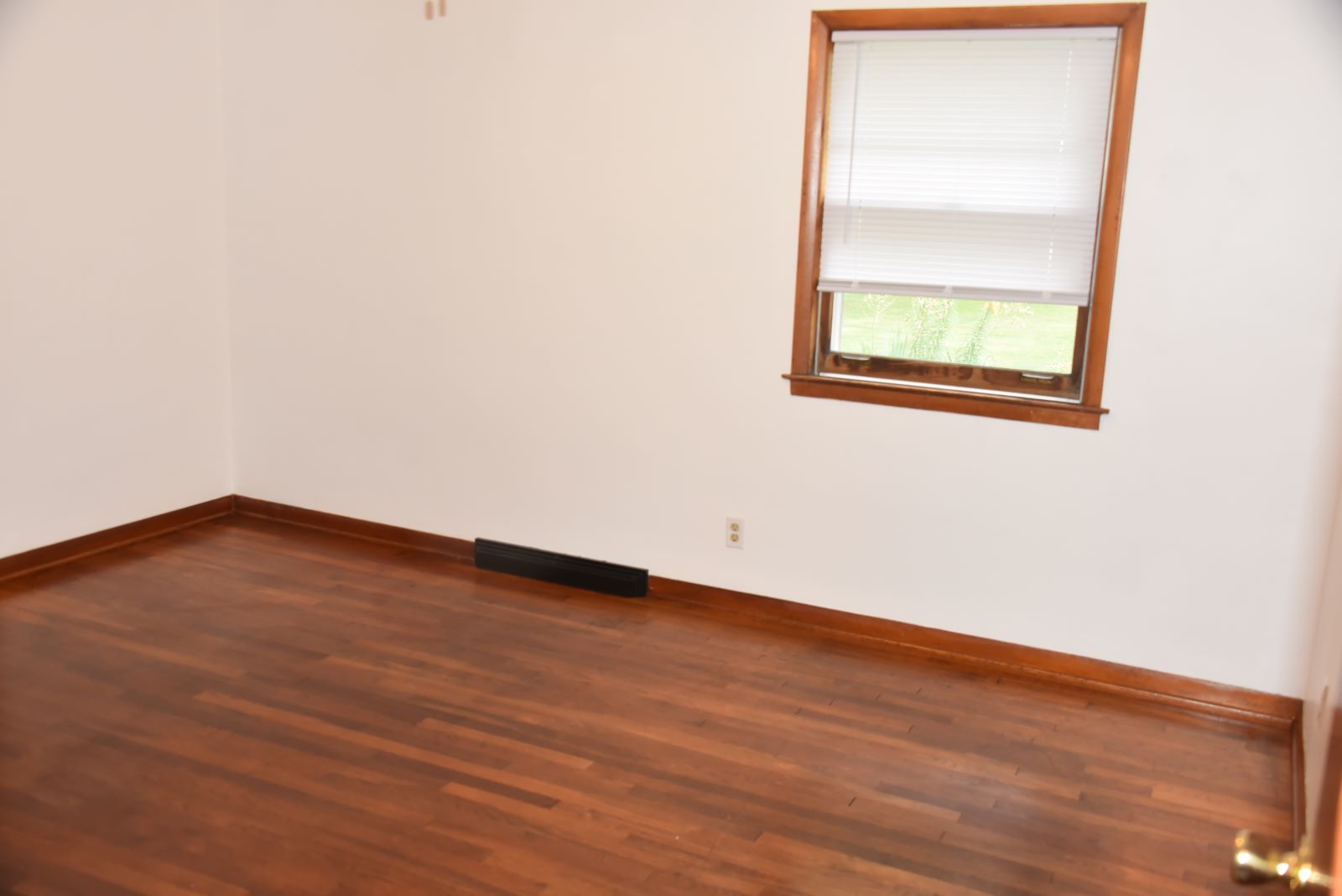 1921 East Steger Road Crete, IL 60417 - Photo 17 of 29 an empty room with a window