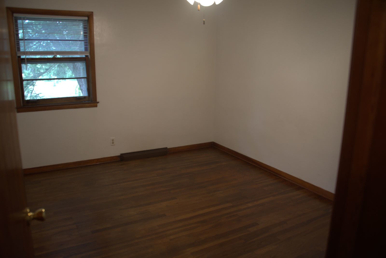 1921 East Steger Road Crete, IL 60417 - Photo 20 of 29 an empty room with a window