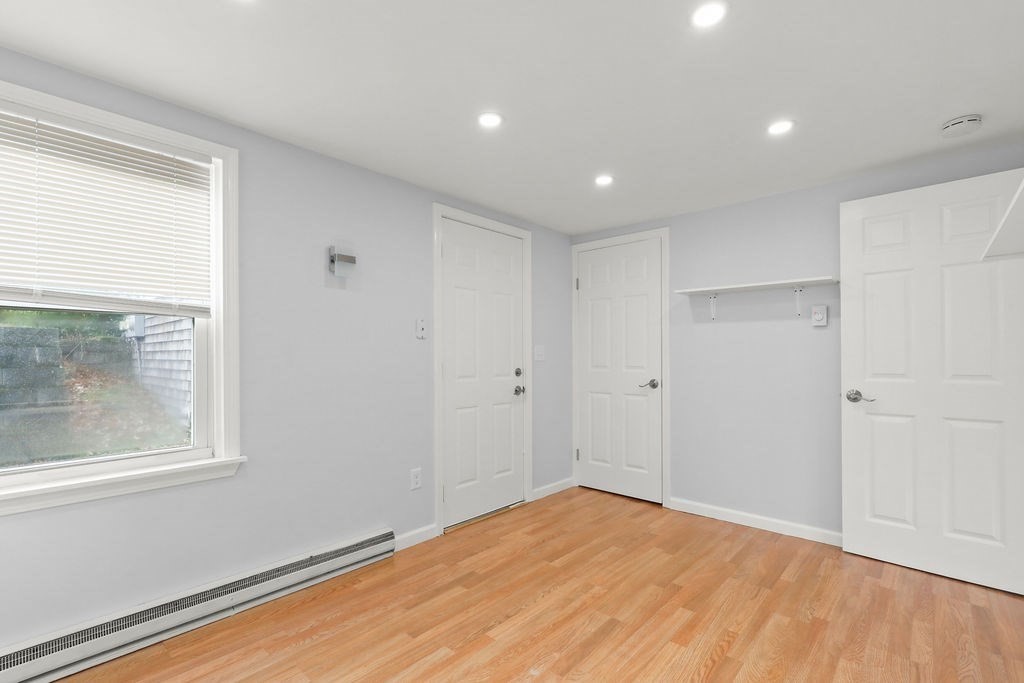 2705 State Highway Eastham, MA 02642 - Photo 14 of 42 a view of empty room with wooden floor and fan