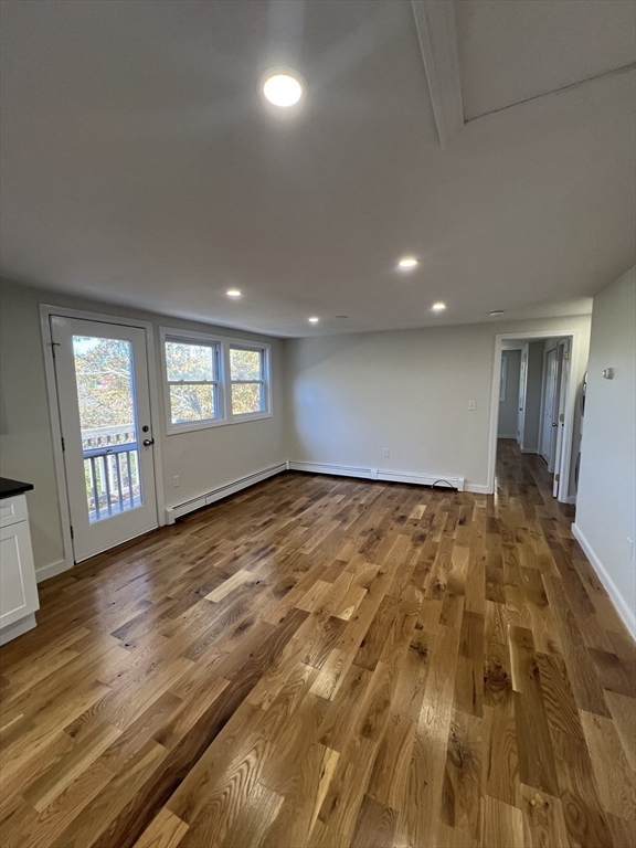 2705 State Highway Eastham, MA 02642 - Photo 19 of 42 a view of empty room with wooden floor and fan