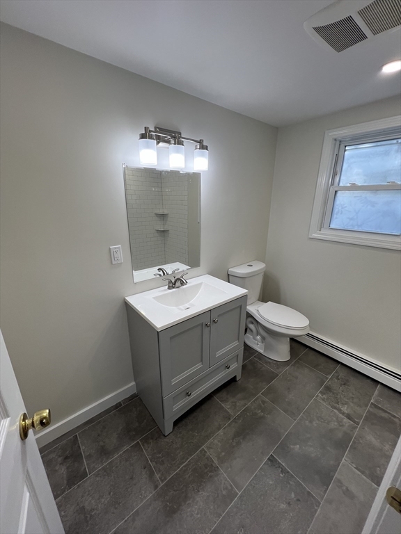 2705 State Highway Eastham, MA 02642 - Photo 20 of 42 a bathroom with a sink mirror and toilet