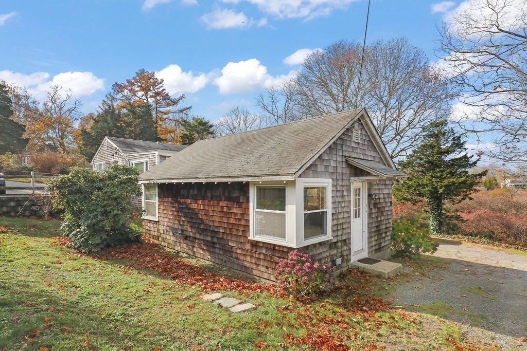 2705 State Highway Eastham, MA 02642 - Photo 32 of 42 a view of a house with a yard